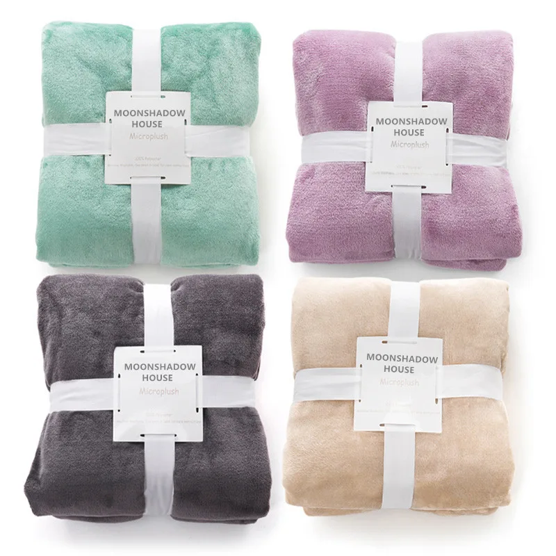 Microplush blankets in mint, purple, gray and beige