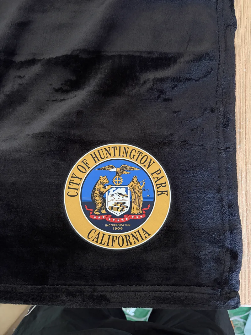 Custom heat transfer logo on fleece blanket